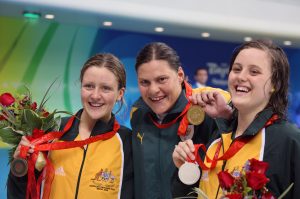 The medallists in the women's S9 100m butterfly event at the Beijing 2008 Paralympic Games. Left to right: Annabelle Williams of Australia (bronze), Natalie du Toit of South Africa (gold) and Ellie Cole of Australia (bronze).